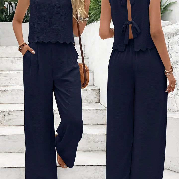 Casual set, wide pants, sleeveless blouse, open back with tie, detail on the hem of the blouse