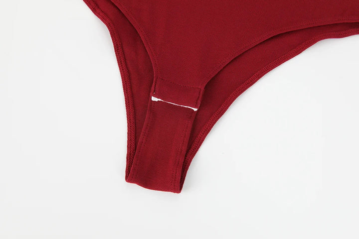 Sleeveless bodysuit with high neck