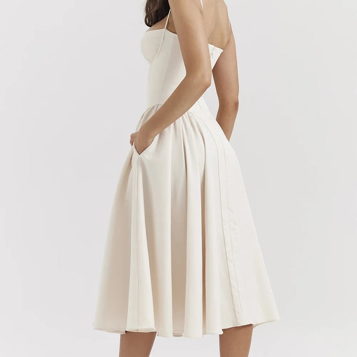 High-waisted summer dress with princess neckline and thin straps