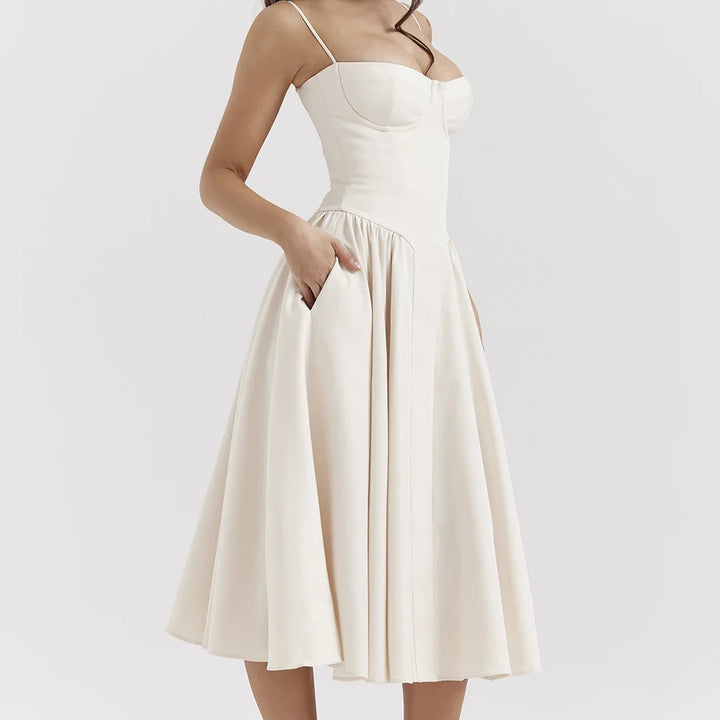 High-waisted summer dress with princess neckline and thin straps