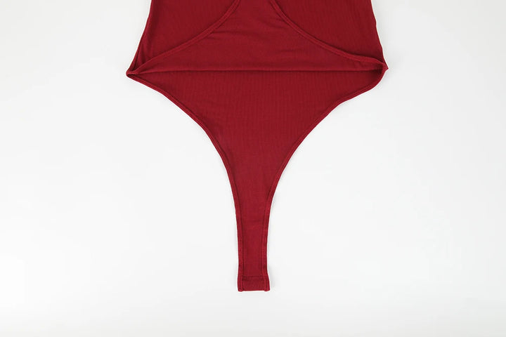 Sleeveless bodysuit with high neck