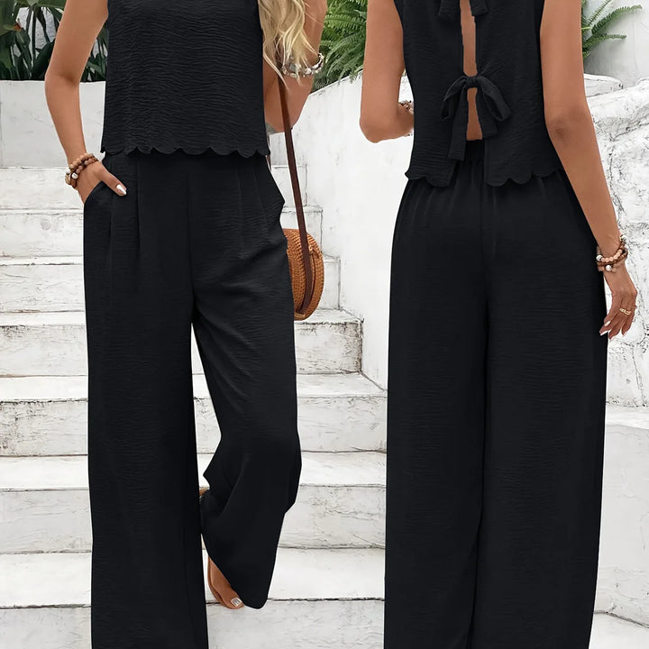 Casual set, wide pants, sleeveless blouse, open back with tie, detail on the hem of the blouse