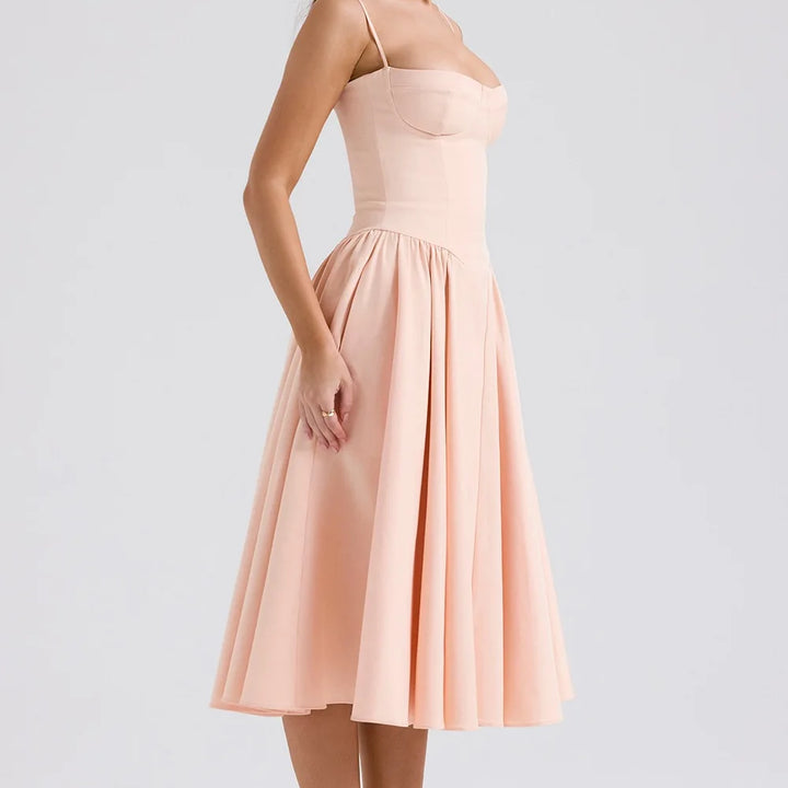 High-waisted summer dress with princess neckline and thin straps